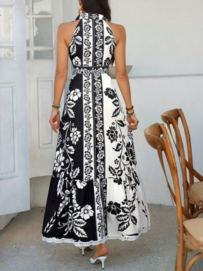 Vestido Longo Listrado com Decote Halter e Fenda Lateral